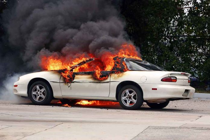 Man Setting Fire to Car Calls Attention to Electric Vehicle Problems