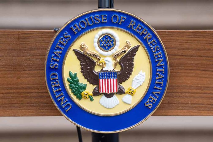 United States House of Representatives emblem on a podium.