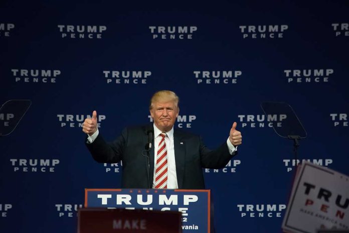 Man giving thumbs up at Trump Pence rally.