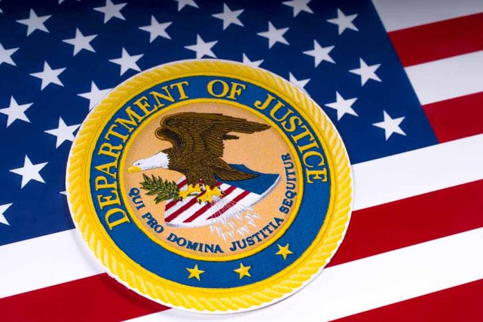 Department of Justice emblem on the American flag.