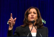 Woman speaking passionately at a podium.