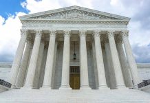 Supreme Court building with columns and detailed pediment.