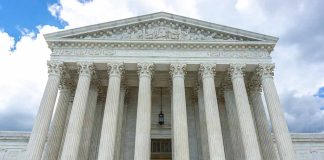 Supreme Court building with columns and detailed pediment.