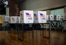 Voting booths set up in a room.