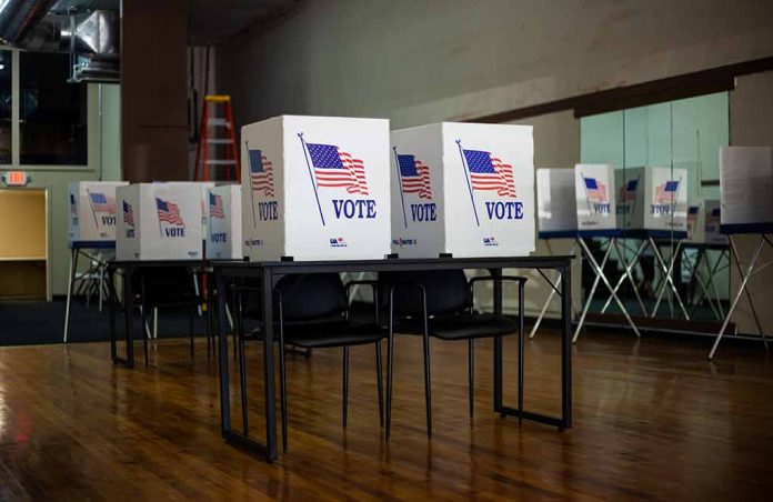 Voting booths set up in a room.