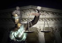 Blindfolded Lady Justice with scales, Supreme Court background.