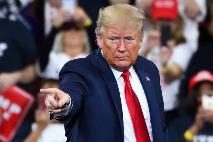 Man pointing at an audience during a speech.