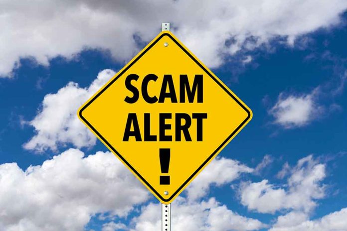 Yellow diamond sign saying scam alert warning