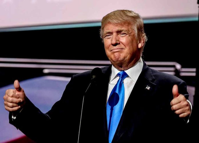 Man in suit giving thumbs up gesture.