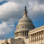 US Capitol Building with American flags and clouds