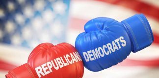 Red and blue boxing gloves with political party names.