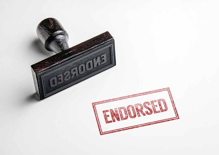 Rubber stamp with "ENDORSED" text on paper.