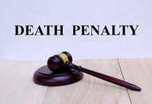 "Gavel with 'Death Penalty' text background."