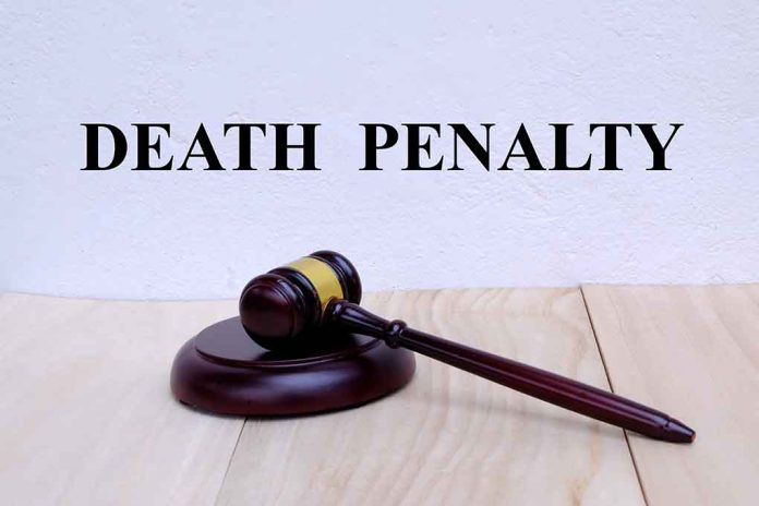 "Gavel with 'Death Penalty' text background."