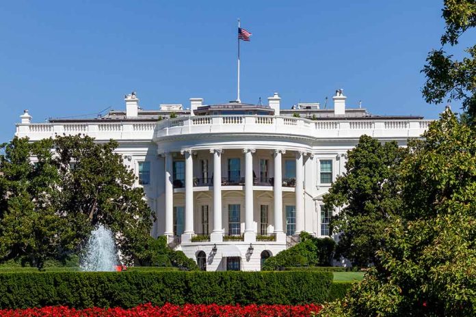 White House with American flag and garden