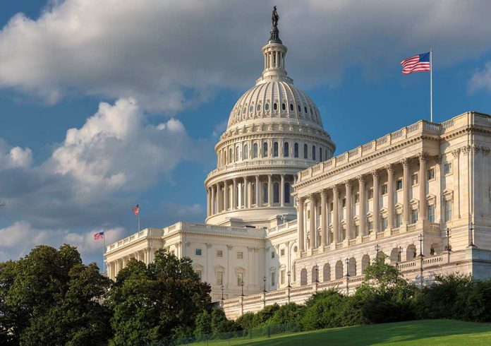 United States Capitol building with American flags nearby