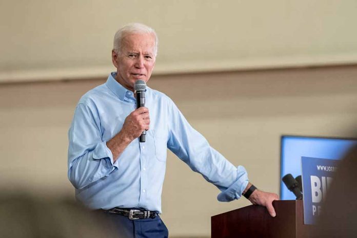 1389604598 featured image Man speaking into microphone at event podium indoors