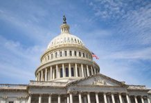 US Capitol Building with American flag flying