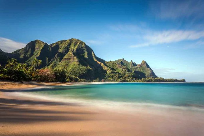 268481546 featured image Beach with mountains and clear blue water
