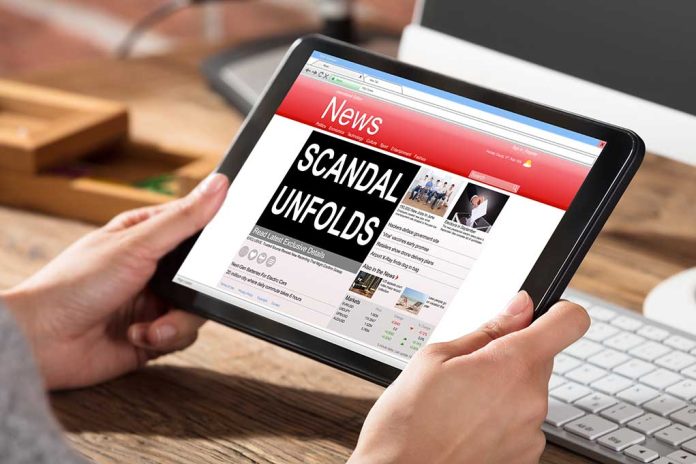 625950956 featured image Person reading news headline Scandal Unfolds on tablet