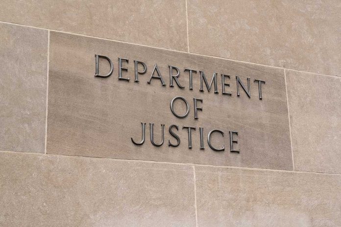 693016663 featured image Department of Justice sign on a building.