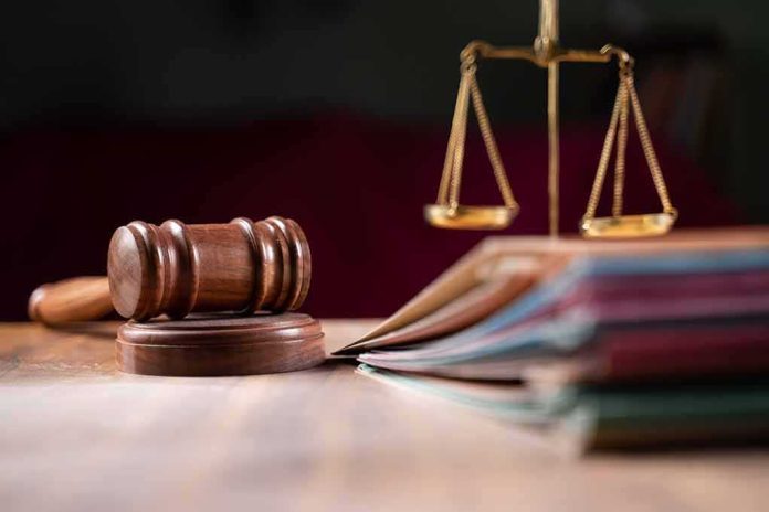 Judges gavel scales of justice and legal documents