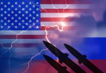 U S and Russian flags with missiles and lightning