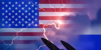 U S and Russian flags with missiles and lightning