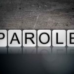 Blocks spelling parole on grungy background