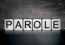 Blocks spelling parole on grungy background