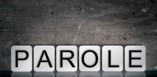 Blocks spelling parole on grungy background