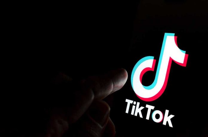 1540774727 featured image Finger pointing at TikTok logo on a screen