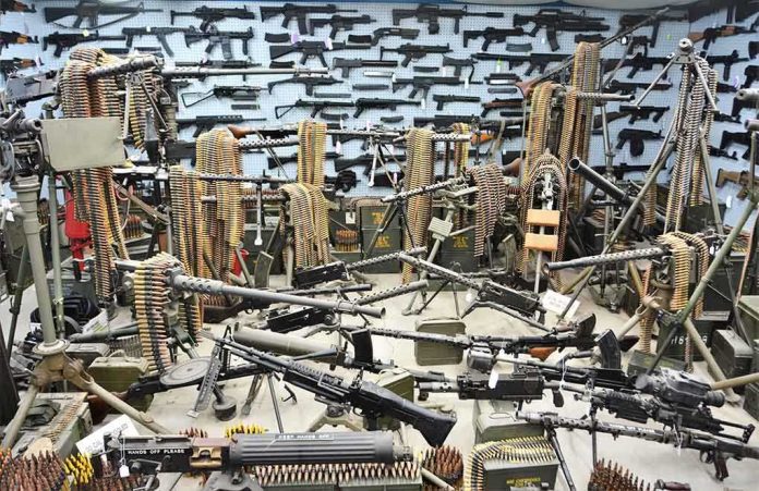 1967096365 featured image Room filled with various firearms and ammunition belts