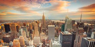New York City skyline at sunset with tall buildings