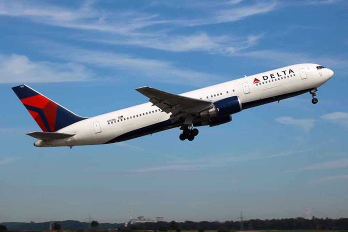 97178177 Delta airplane taking off from runway
