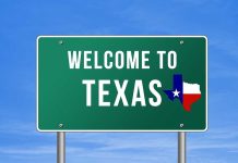 Welcome to Texas road sign with a Texas map