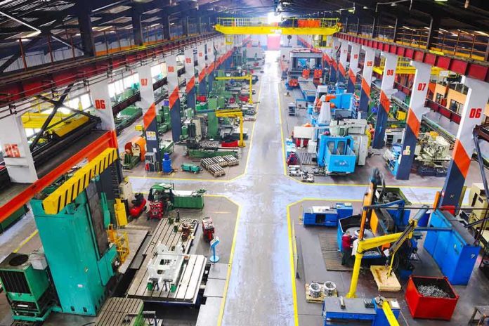 shutterstock_75131428.jpg Aerial view of a large industrial workshop filled with various machinery and equipment