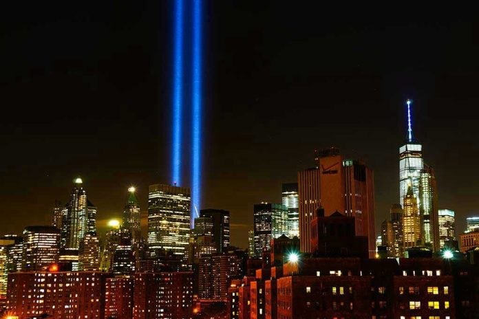 1495332722 New York City skyline at night with memorial lights.
