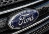 Ford logo on car grille close-up.
