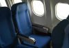 Emergency LANDING: In-Flight STABBING, Passengers Attacked! Empty airplane seats next to windows.