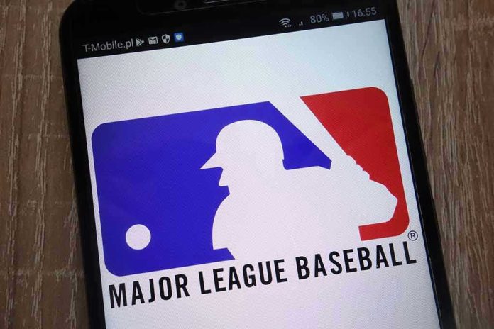 Major League Baseball logo on a smartphone screen.
