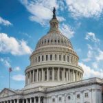 Washington Under SIEGE – 500 Troops Deployed U.S. Capitol building dome under clear blue sky.
