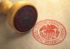 Trump’s Fed Chair Pick – He Has Decided Federal Reserve stamp and wooden stamp on paper