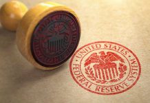 Trump’s Fed Chair Pick – He Has Decided Federal Reserve stamp and wooden stamp on paper