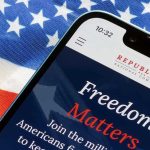 GOP Power Play – Menacing Text Blitz! Smartphone and American flag promoting Republican National Committee.