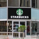 Nationwide Strike CRIPPLES Starbucks – Corporate Assault! Starbucks storefront with glass doors and logo