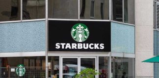 Starbucks storefront with glass doors and logo