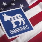 Democratic Party symbol on American flag background.