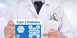 Doctor holding tablet displaying Type 2 Diabetes information