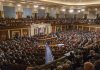 No Work, No Pay – Congressional Checks FROZEN! Large assembly in a government legislative chamber.